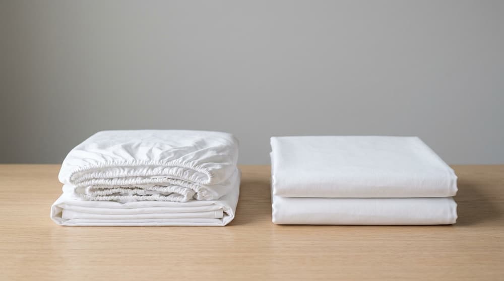 Drap Plat ou Drap-Housse : Le Guide pour Enfin les Utiliser Correctement
